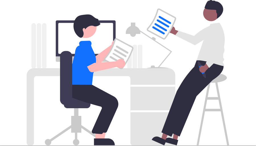 Two people collaborating at a desk, one offering expert assistance with a tablet while the other works on a computer